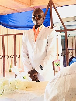 Bro Suah officiating on the Lord’s table